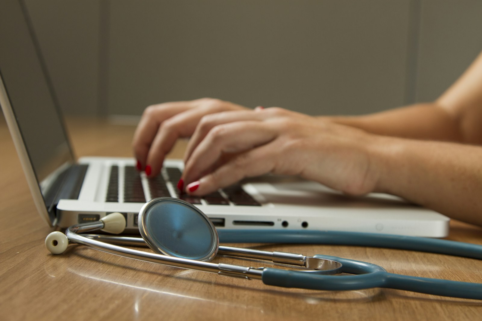 Care professional reviewing notes during a therapy planning session